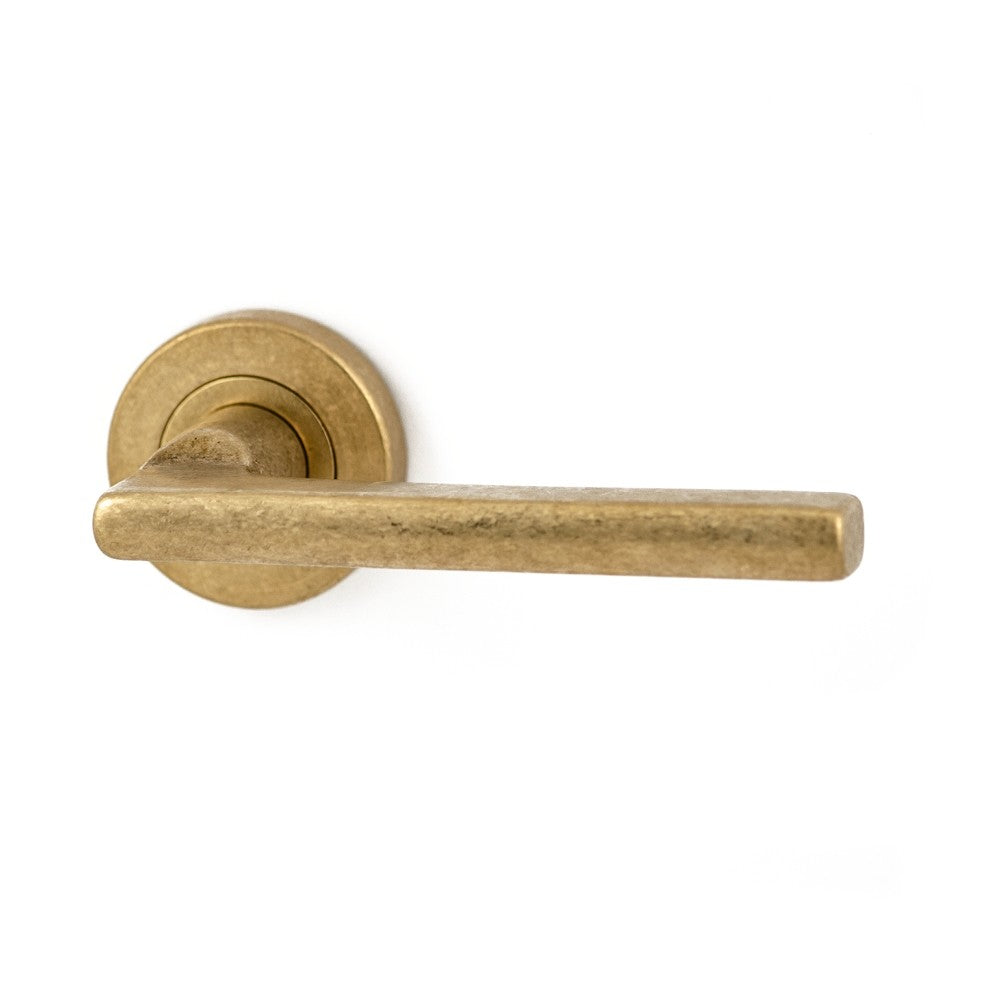 HB Deurklinken Sara op rond rozet - getrommeld messing