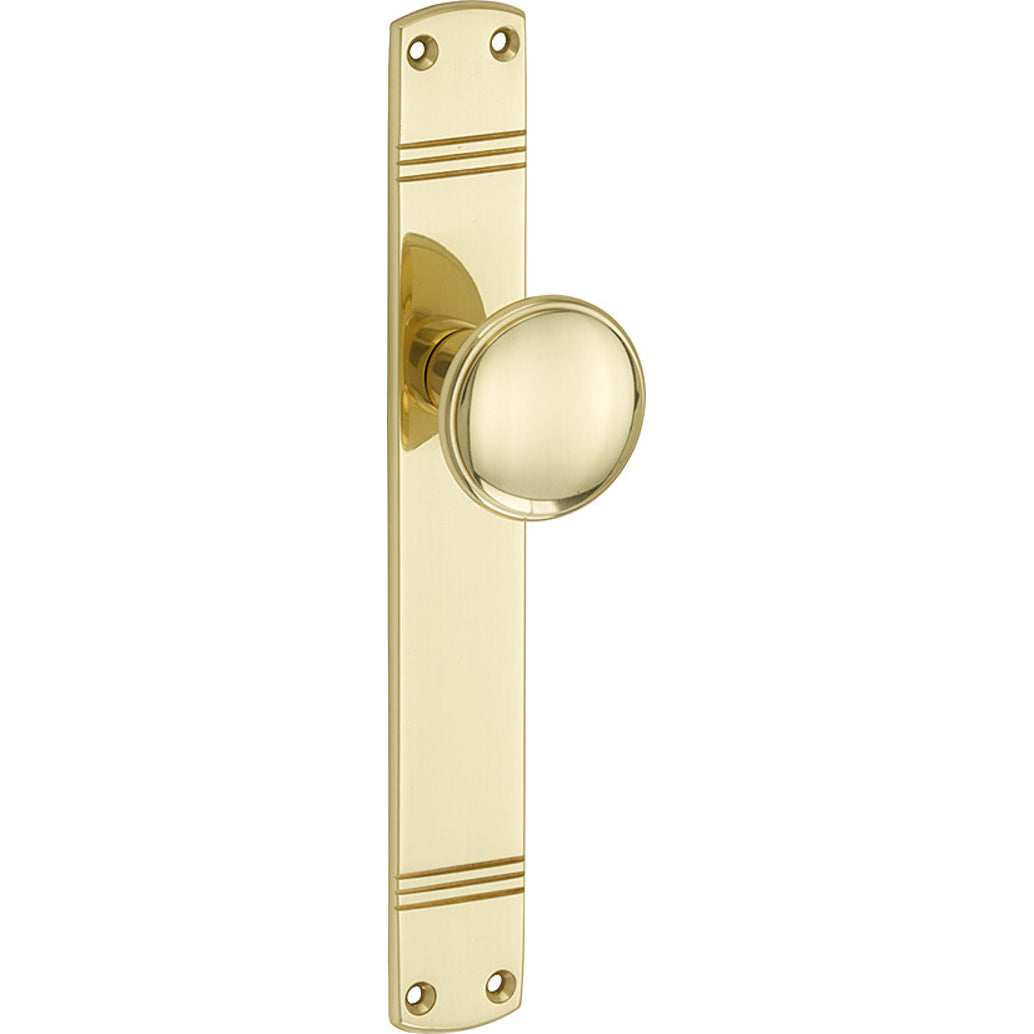 Knopgarnituur Art-Deco messing gelakt op langschild – zonder sleutelgat